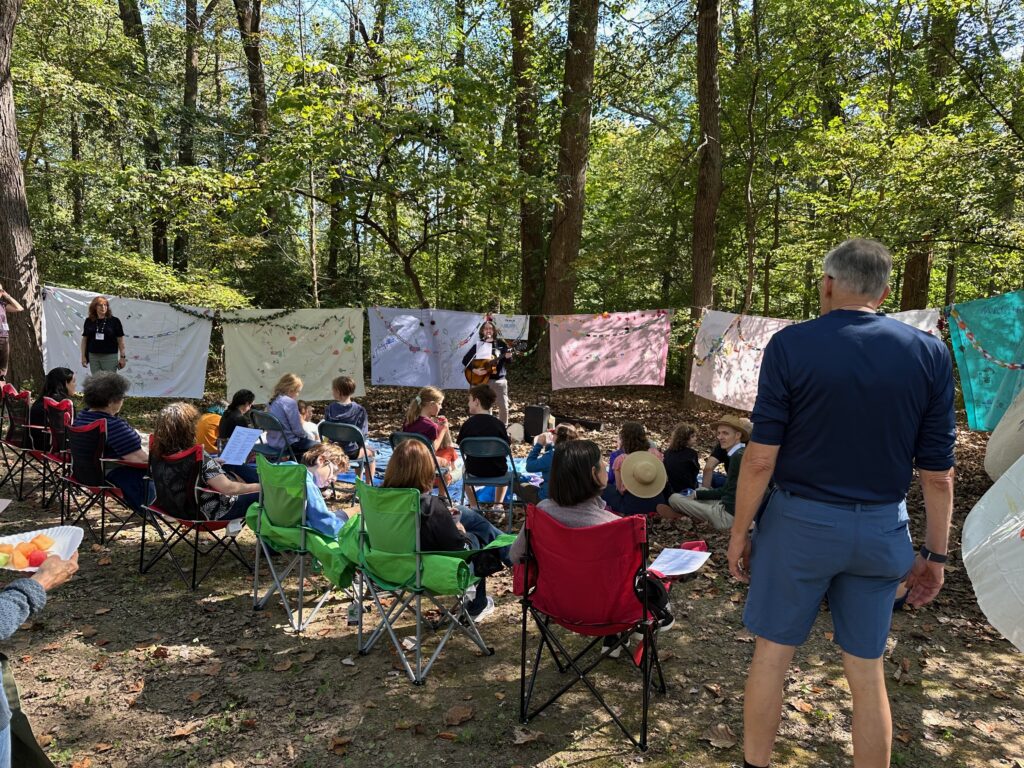 Outdoor Sukkot celebration with kids and adults